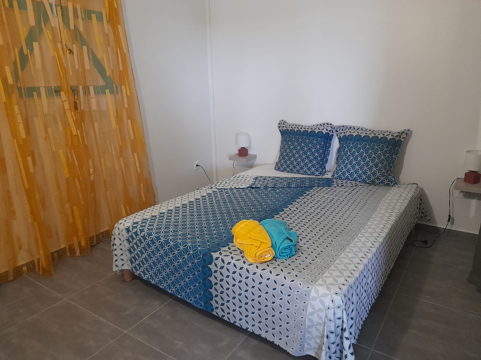 Chambre de Case Turquoise, lit double